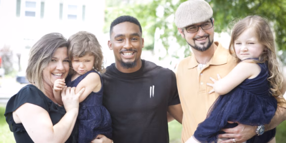 Rashard Davis with Greene Family